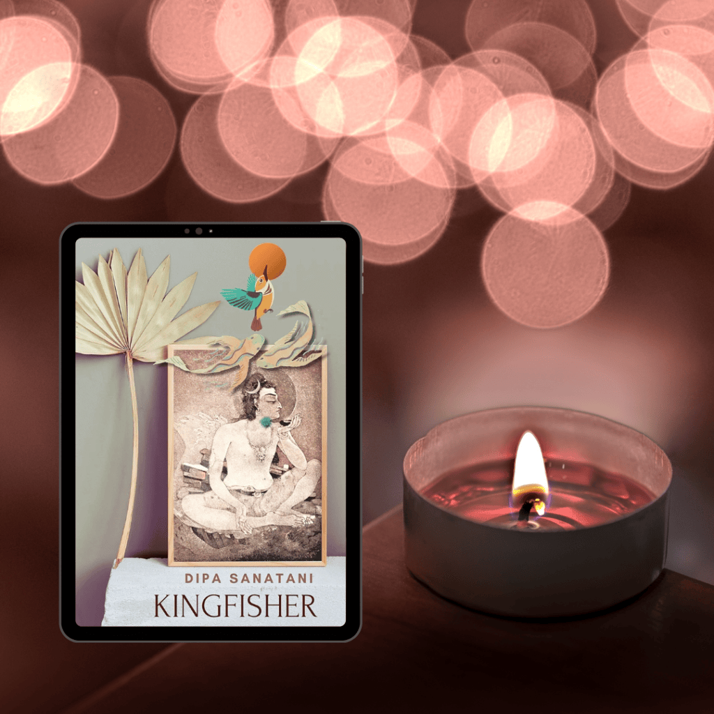 A tablet displaying the cover of 'Kingfisher' by Dipa Sanatani, featuring an illustrated design with a man in a meditative pose and artistic elements. Next to the tablet, there is a lit candle in a holder, with soft bokeh lights in the background.